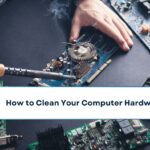 Computer hardware engineering. Engineer soldering computer motherboard